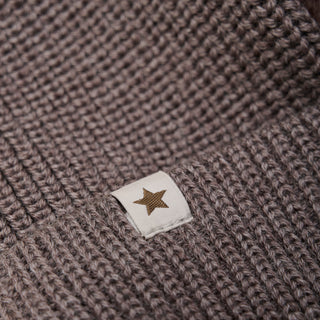 Merinowolle Strickmütze mit Pompons Brown Melange von Huttelihut